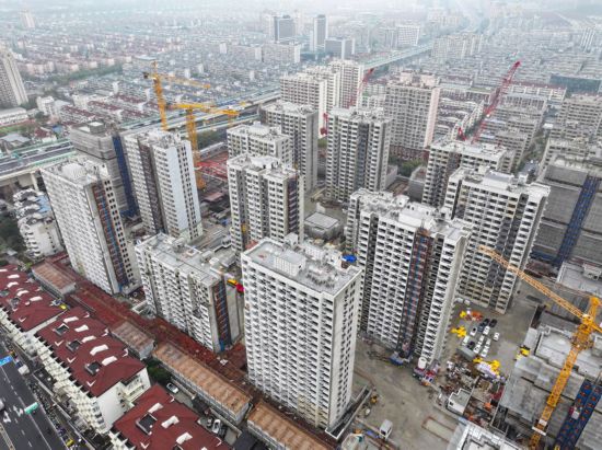 彭一住宅小区旧住房拆除重建工程正进行内外墙装饰预计今年下半年竣工验收(图5)