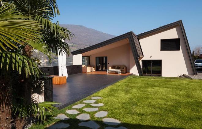 从‘土’到‘潮’只需一步外墙装饰让老屋焕发新生的幽默艺术(图1)